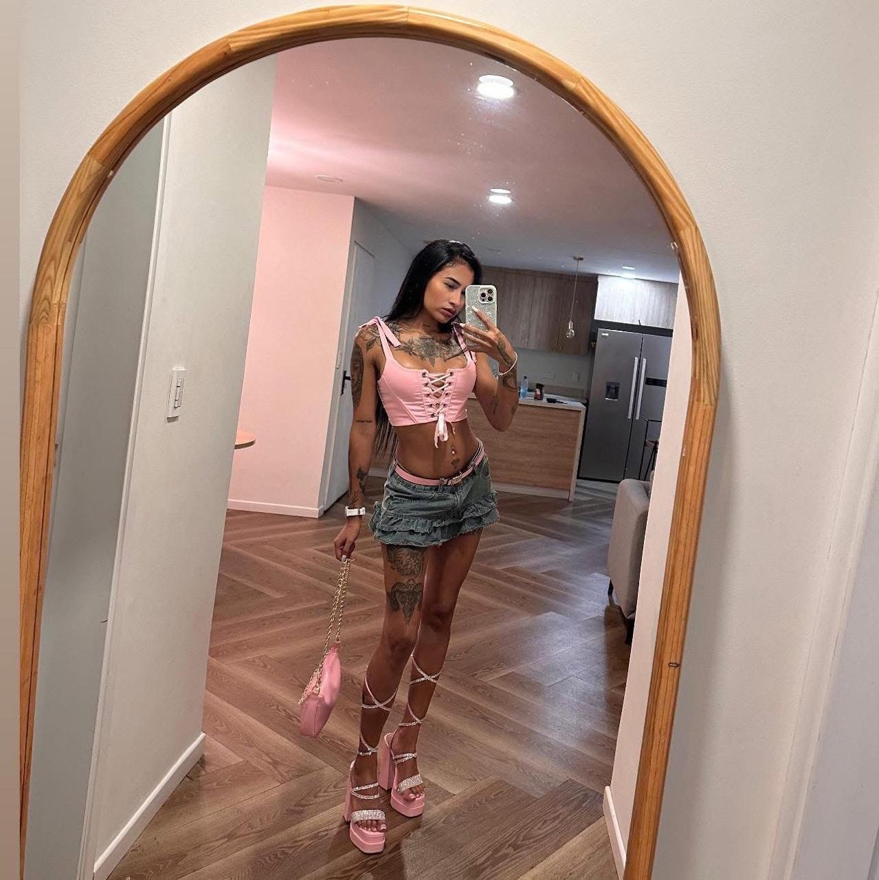 Mirror selfie - black and white outfit with leather vest